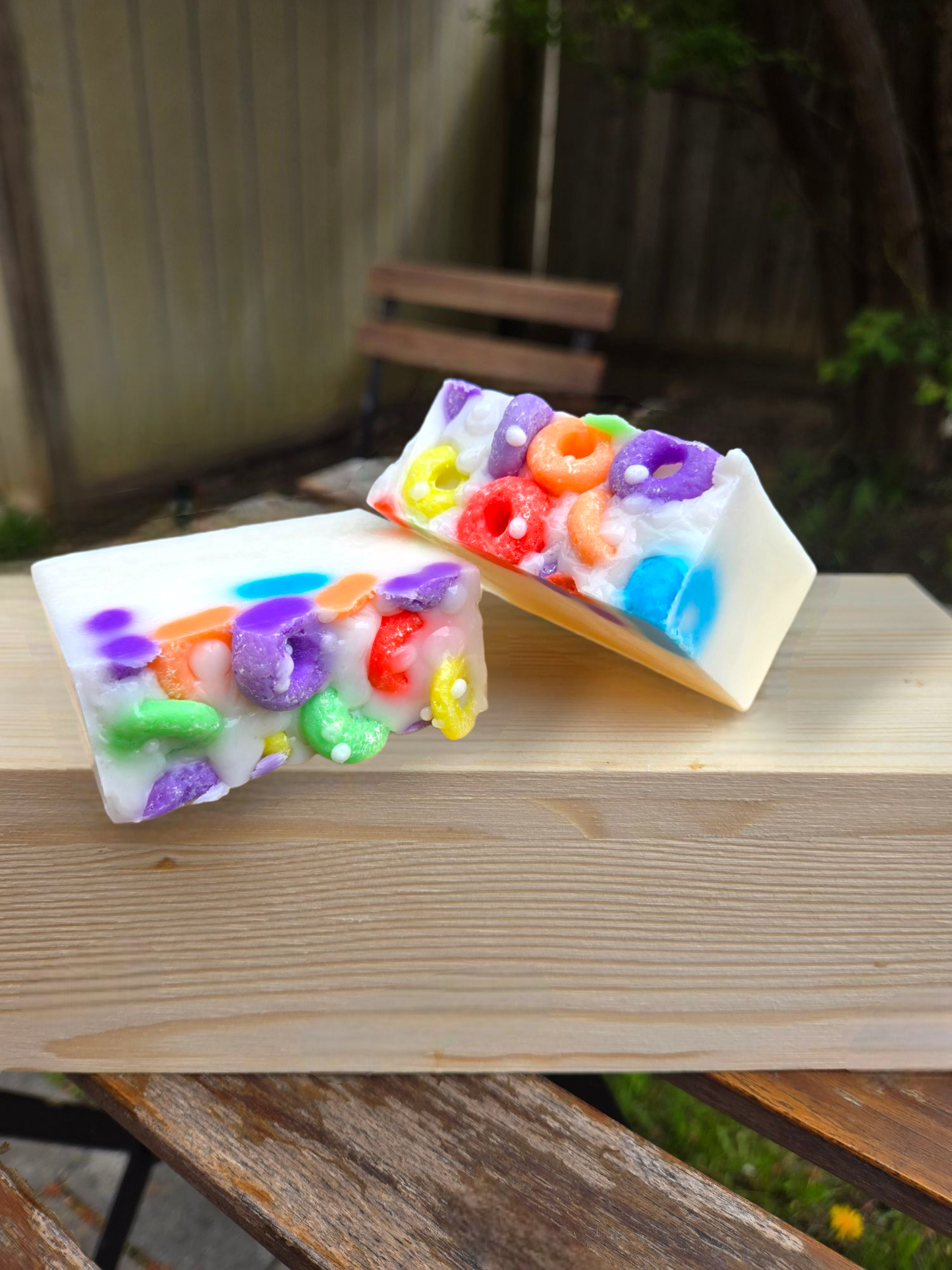 Frooty Loops Bar Soap with colorful cereal-inspired design on a wooden surface.