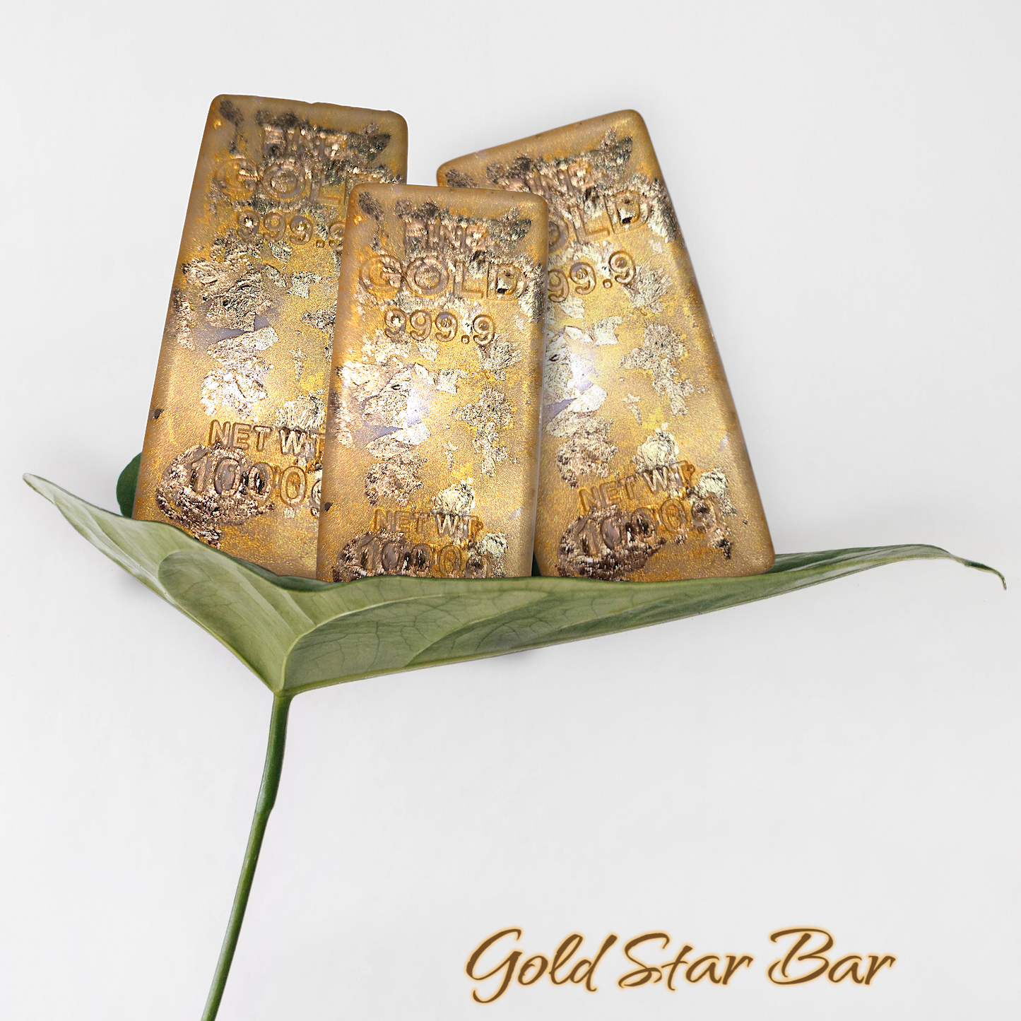 Gold Star Bar soap with moisturizing vegan formula on leaf.