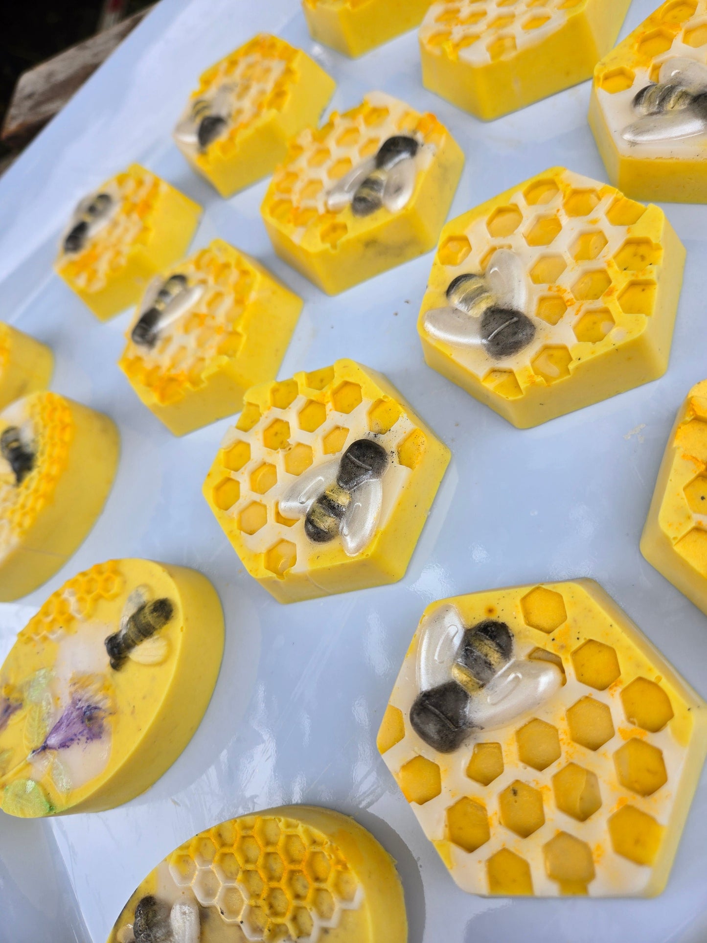 Hexagon-shaped Honey Bars with honeycomb and bee design, formulated with Tumeric Kojic Honey Bar, nourishing butters for skin brightening.