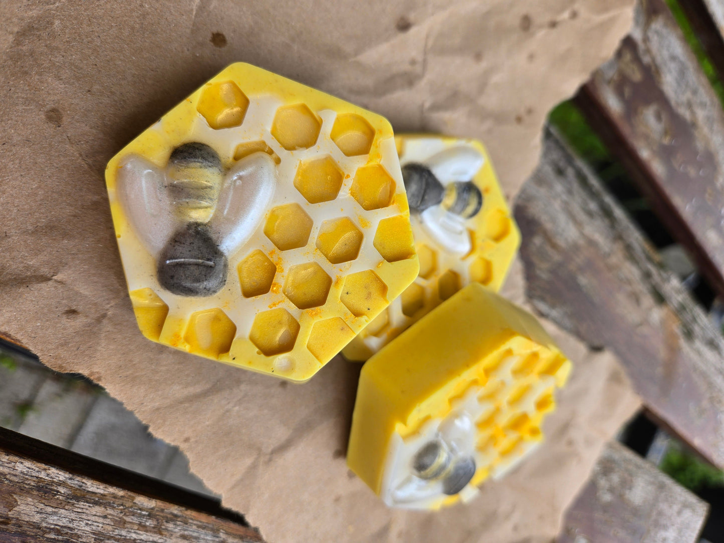 Hexagonal Honey Bar soap with bee design, formulated with turmeric, honey, and Koji acid for skin benefits.