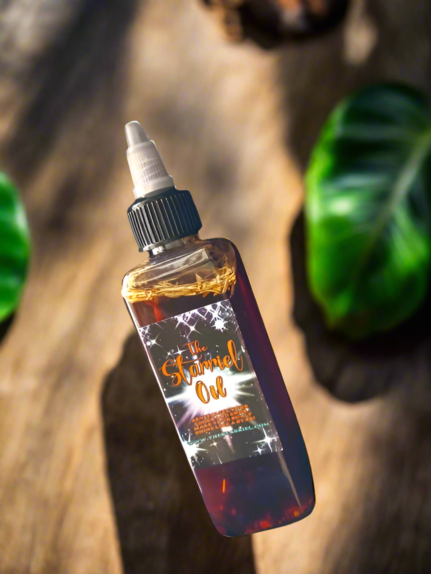 Starriel Oil bottle infused with Ayurvedic and Chebe herbs for hair growth and nourishment.