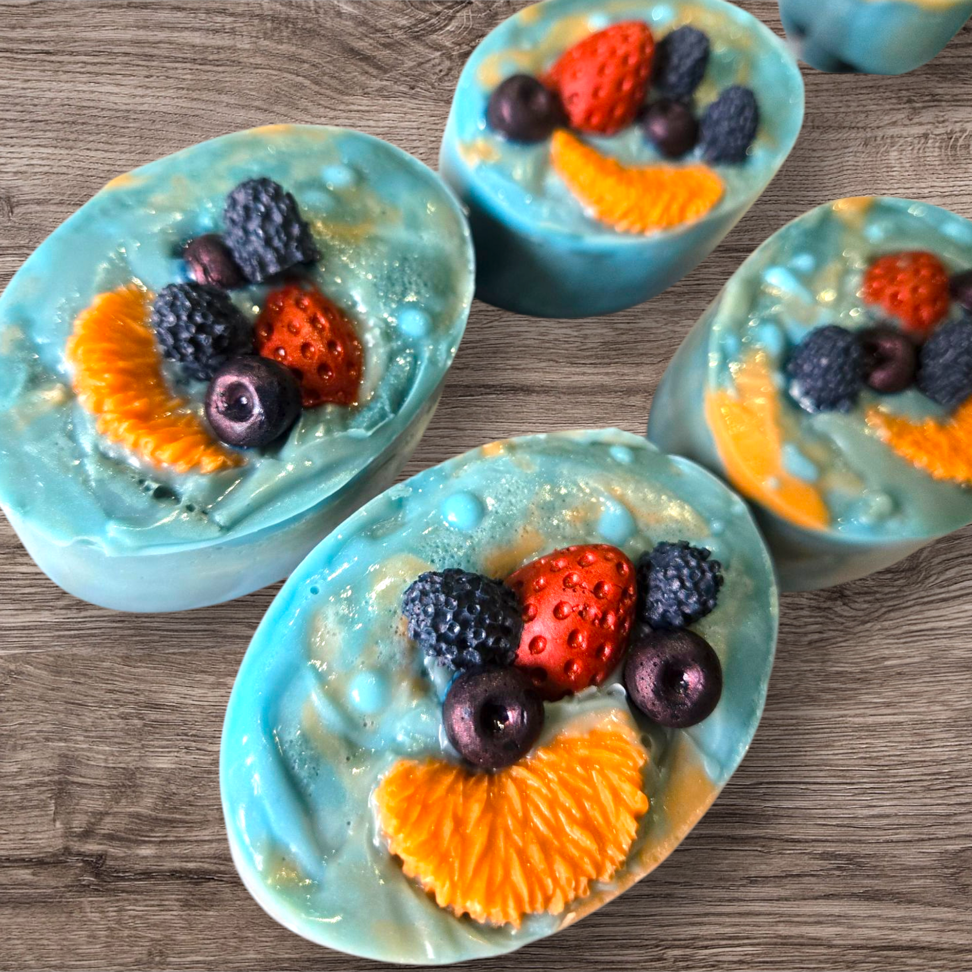 Berry Sorbet Soap Bar with vibrant fruit details on wooden background.